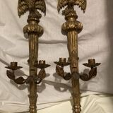 Pair of candle holders in wall, eagle pattern in gilded wood and brass