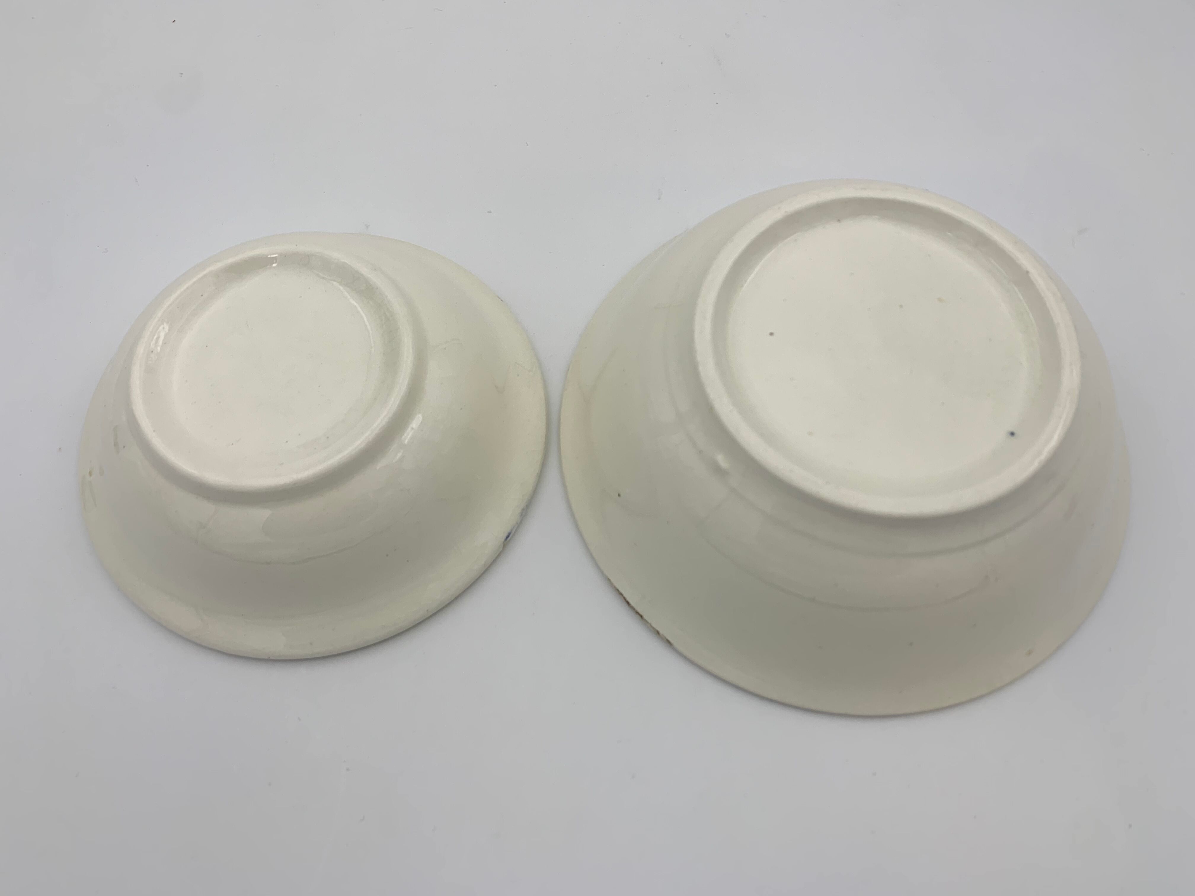 Two vintage cups in white earthenware, blue ledé 1950