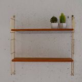 Wall-mounted shelf (Hylla) with brass structure