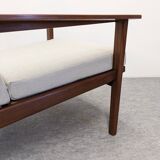 Pair of Scandinavian style armchairs in teak, France circa 1950.