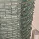 Blue-tinted glass lamp and wire.