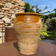 Ancient terracotta pottery jar