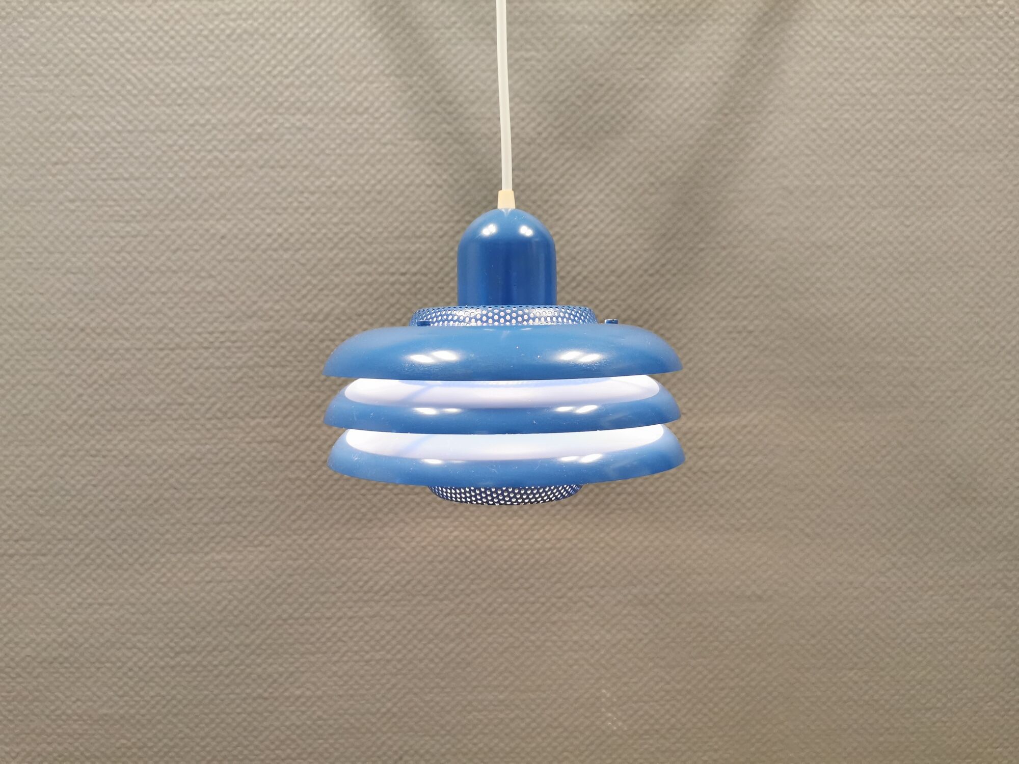 Blue lacquered metal lamp, with several layers of shades, Danish from the 80s.