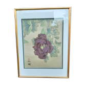 Chinese print of a purple flower under a golden frame.