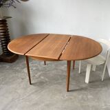 Scandinavian round teak table with extension