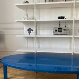 Oval coffee table in blue lacquered wood