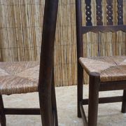Pair of antique straw-seated farm chairs