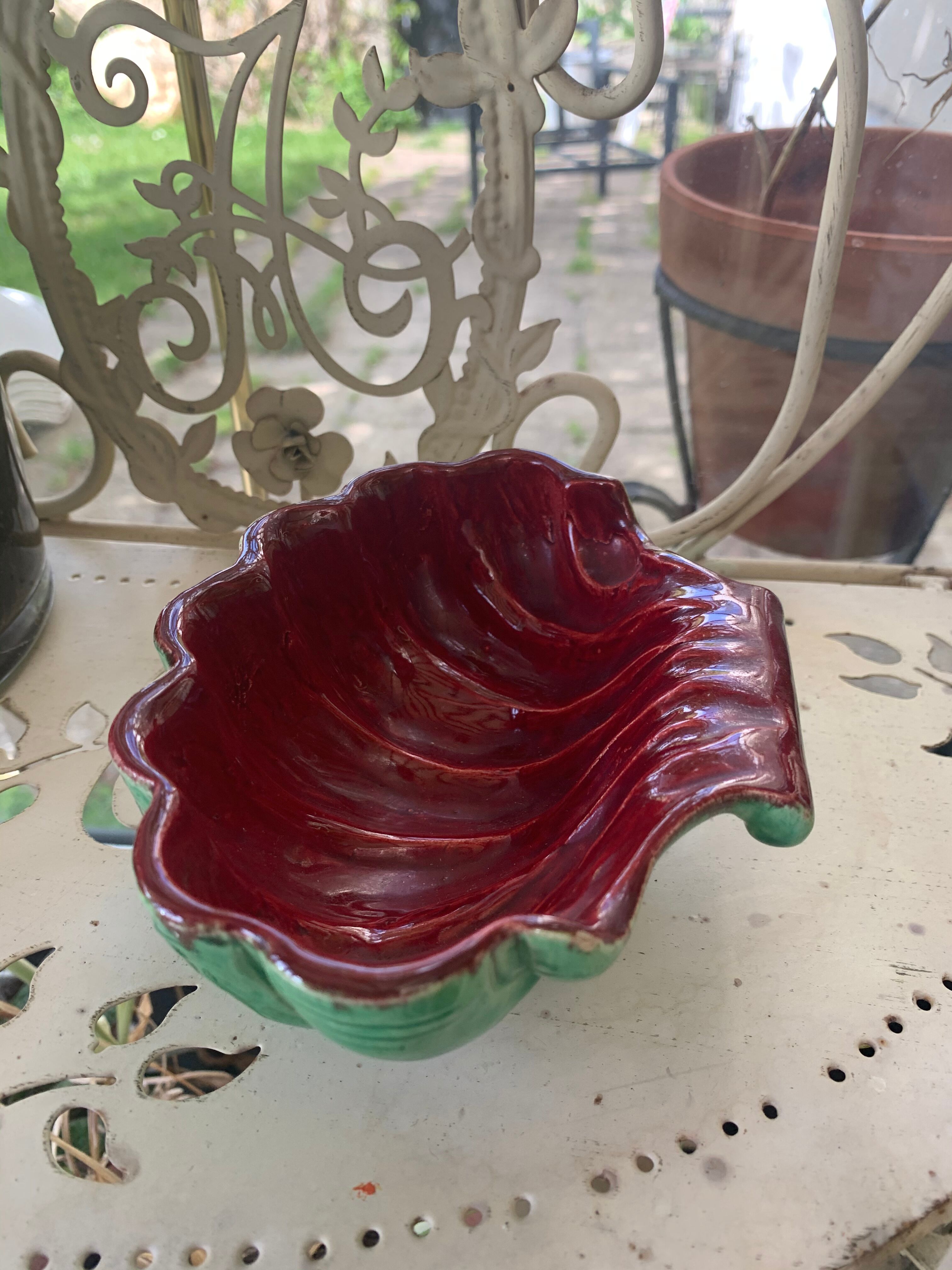 Green and red vintage dabbling enamelled ceramic shell