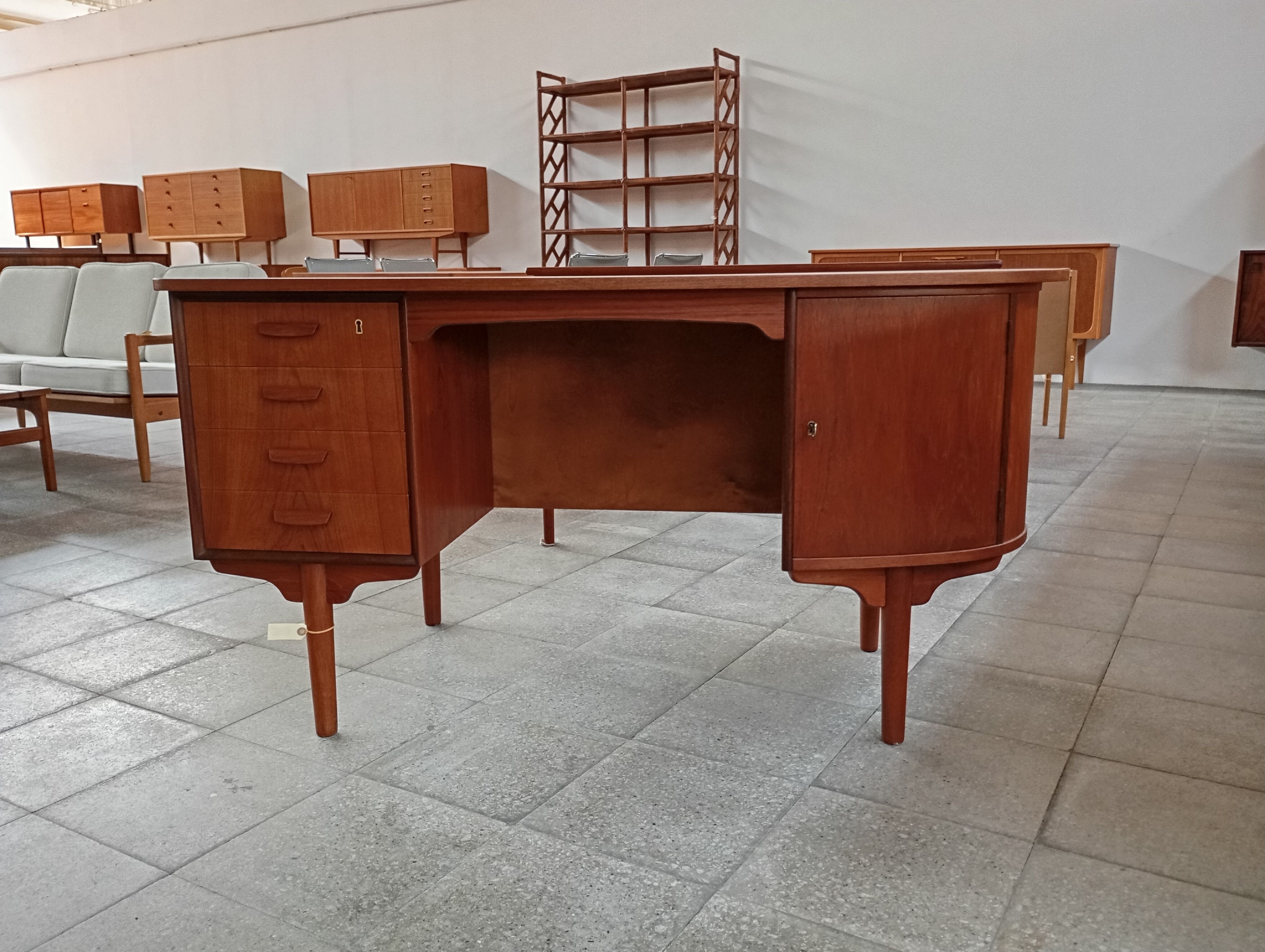 Scandinavian oval desk in teak from the 1960s.