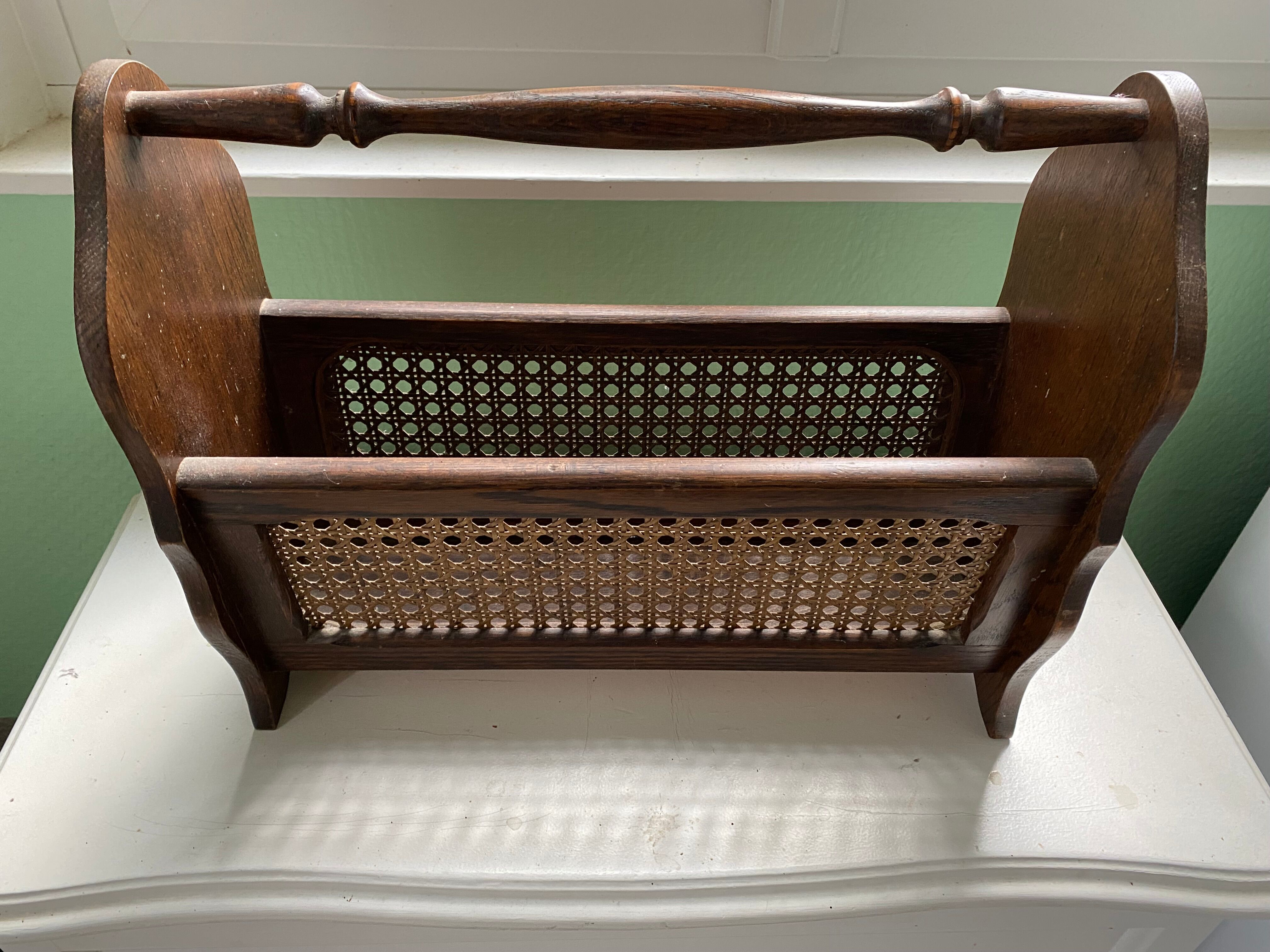 Wooden and cane newspaper rack