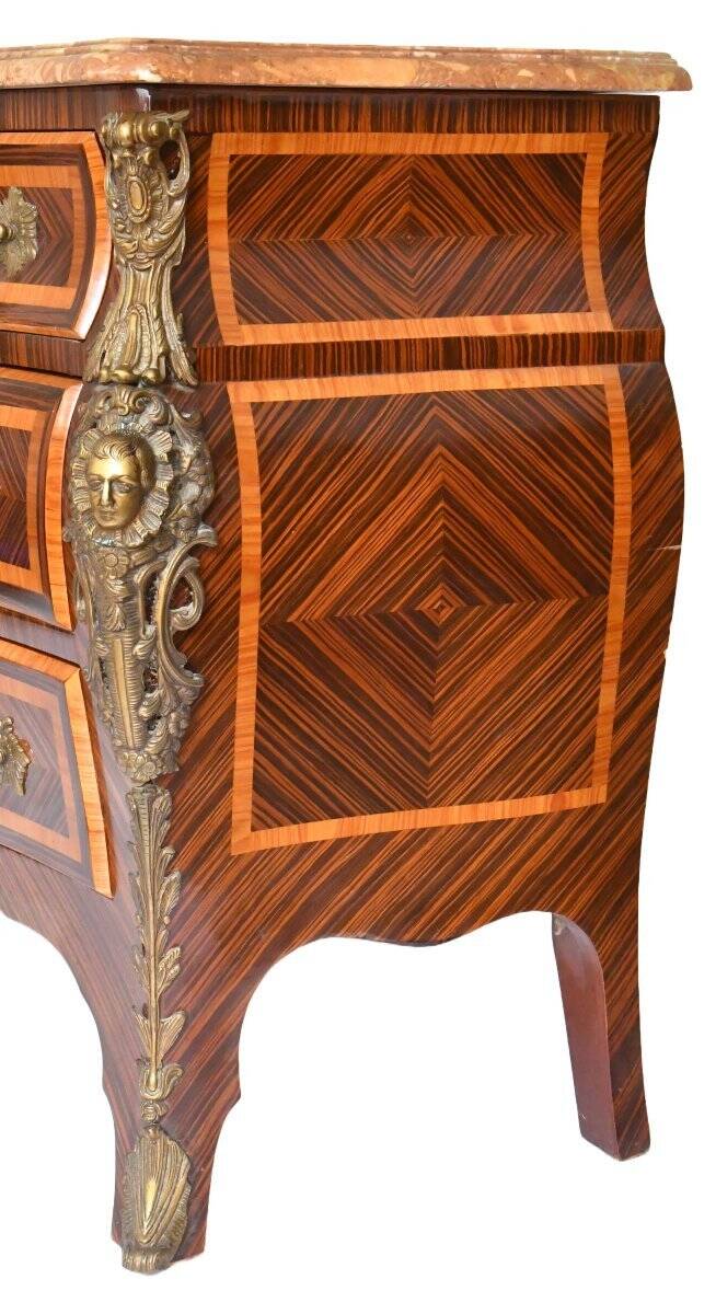 Tomb-shaped commode in Louis XV style with decoration featuring Spanish figures.