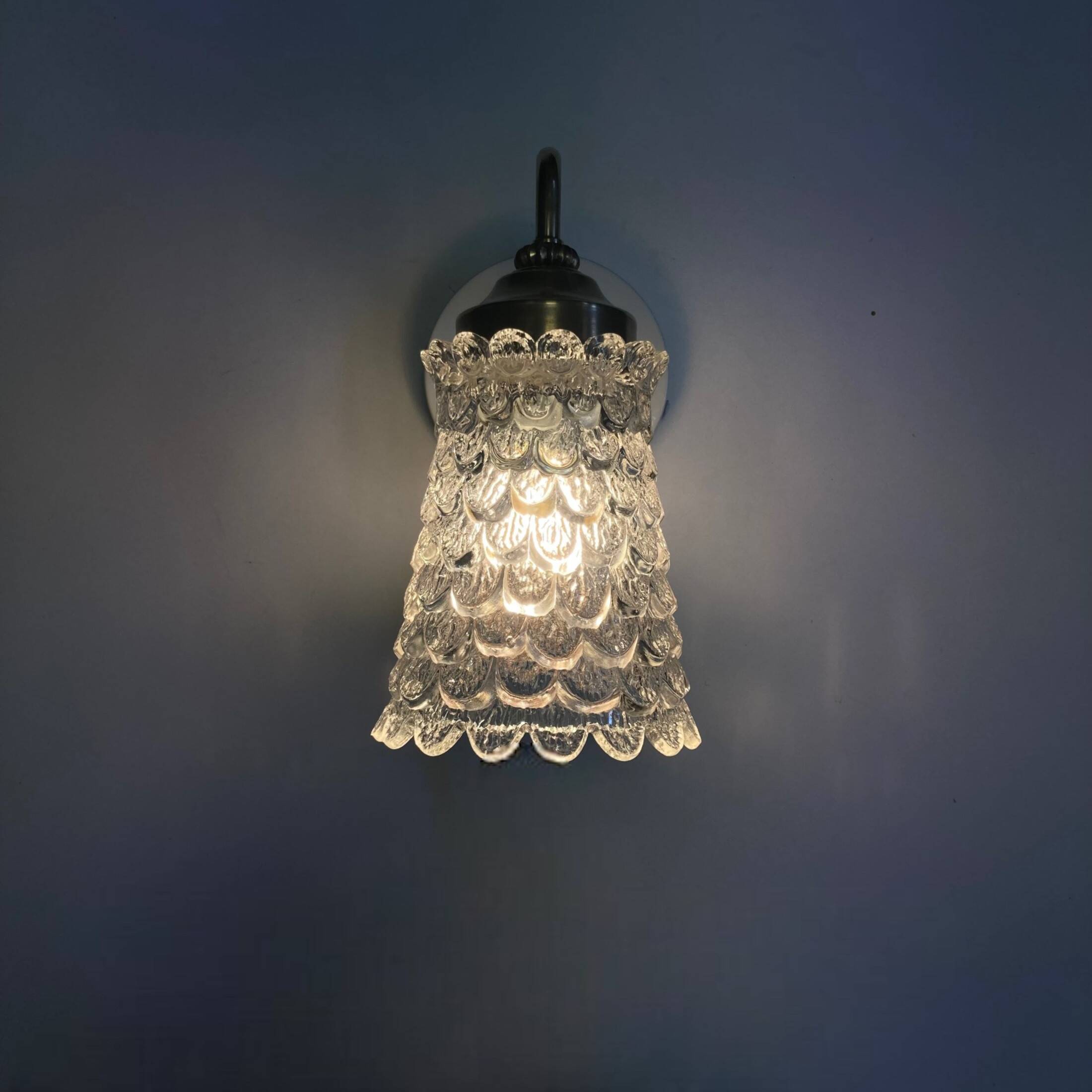 Old brass swan neck wall light and transparent glass tulip vintage decoration