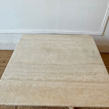 Square coffee table in travertine.