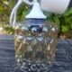 A 70s-vintage amber molded glass "bubble" pendant/lamp