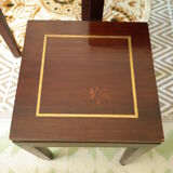 Pull-out tables in mahogany and vintage brass
