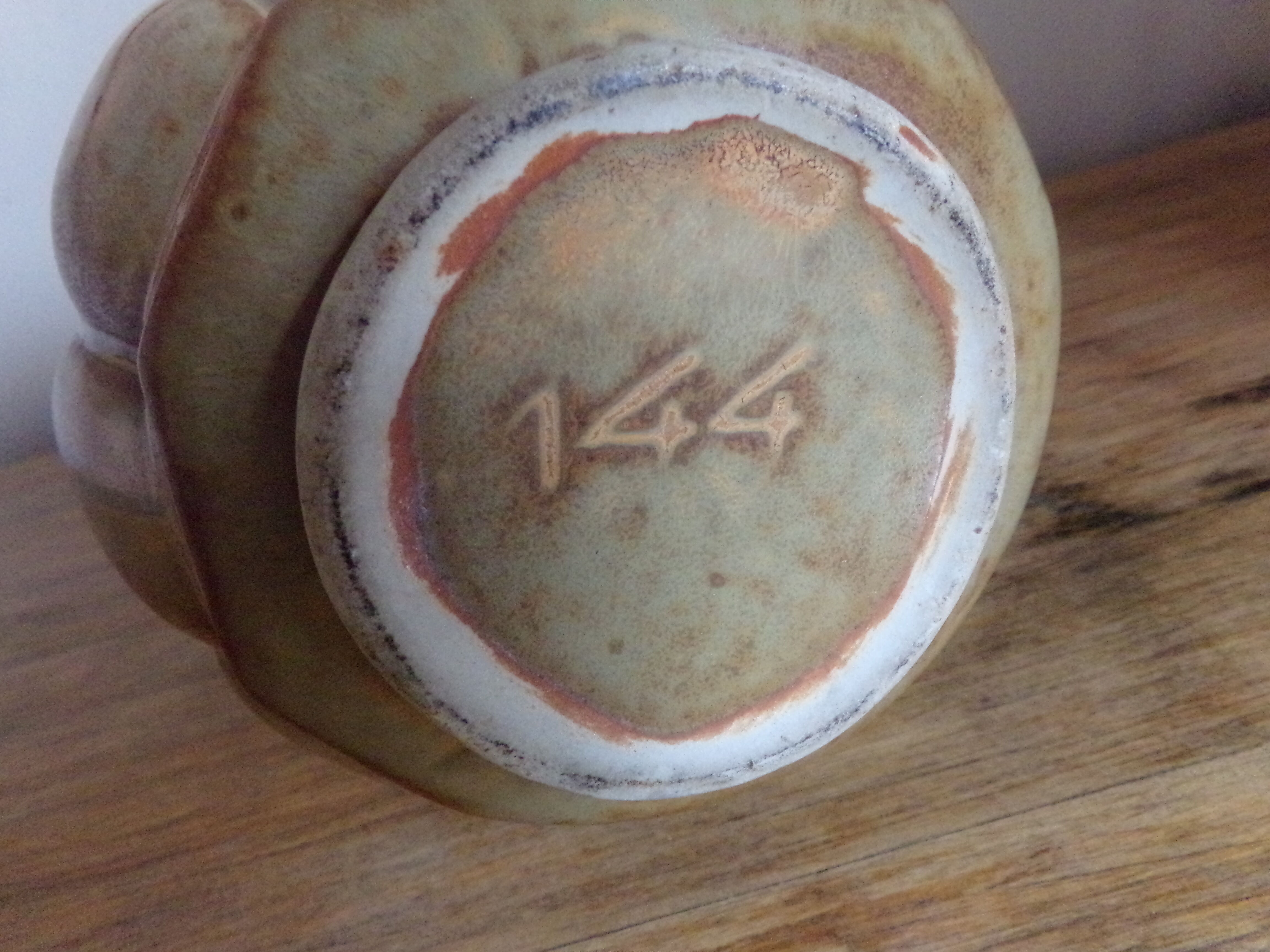 Pitcher in sandstone