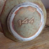Pitcher in sandstone