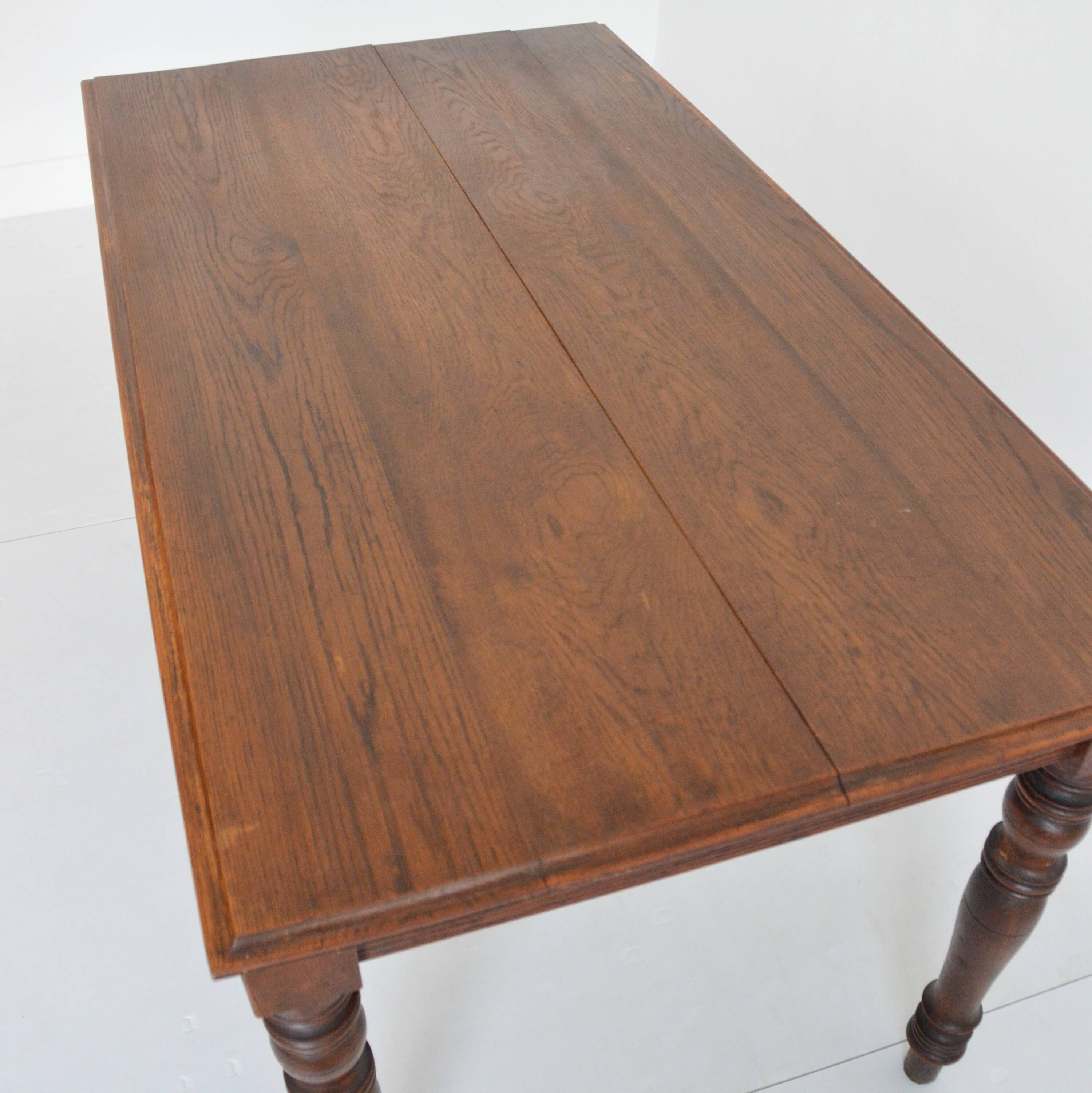 Farm table with extensions from the early 20th century.