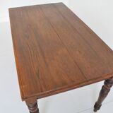 Farm table with extensions from the early 20th century.