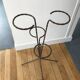 Wrought iron plant holders