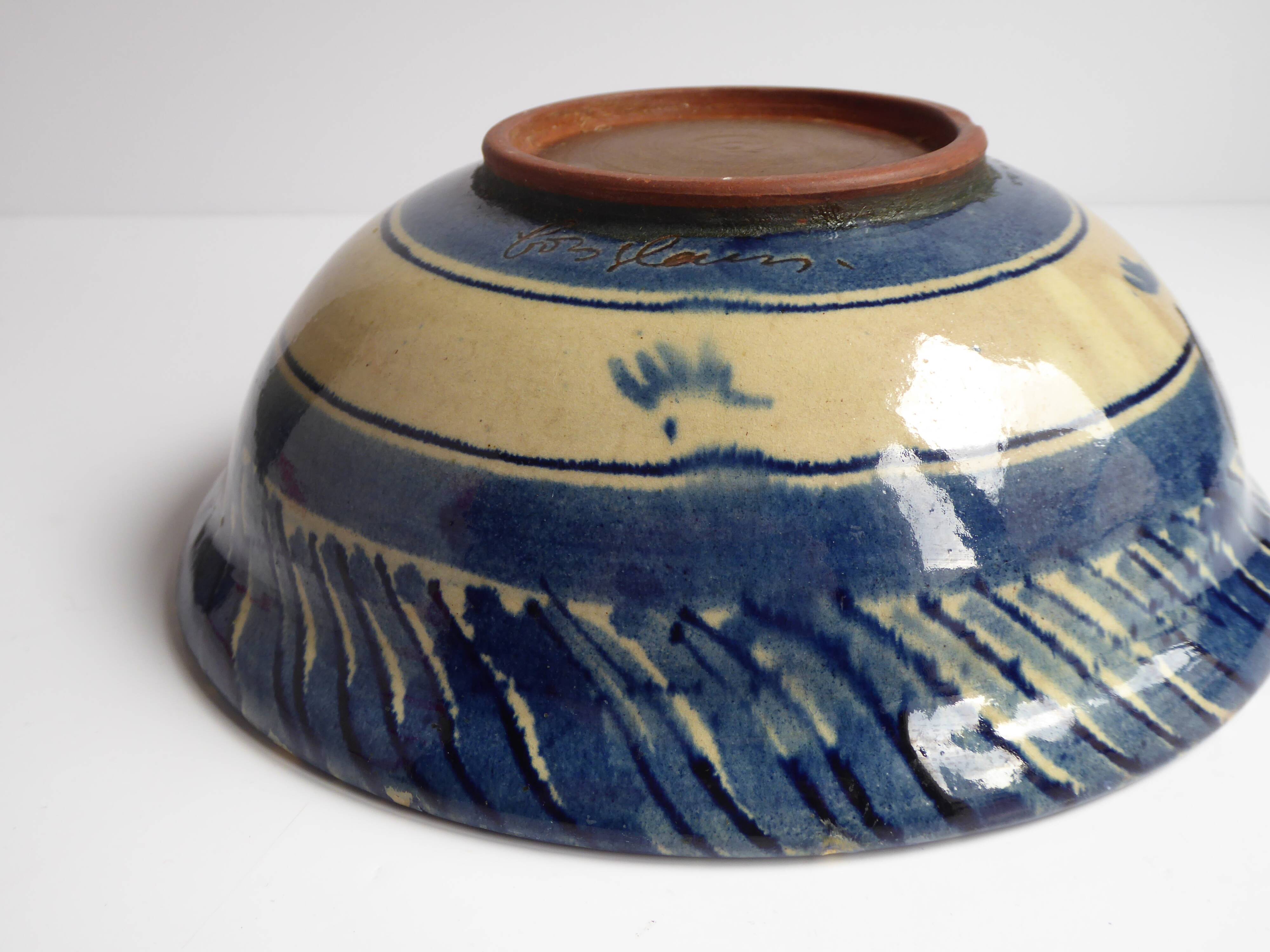 Blue enamelled terracotta cup