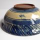 Blue enamelled terracotta cup