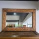 Large wall mirror in carved wood – handcrafted work