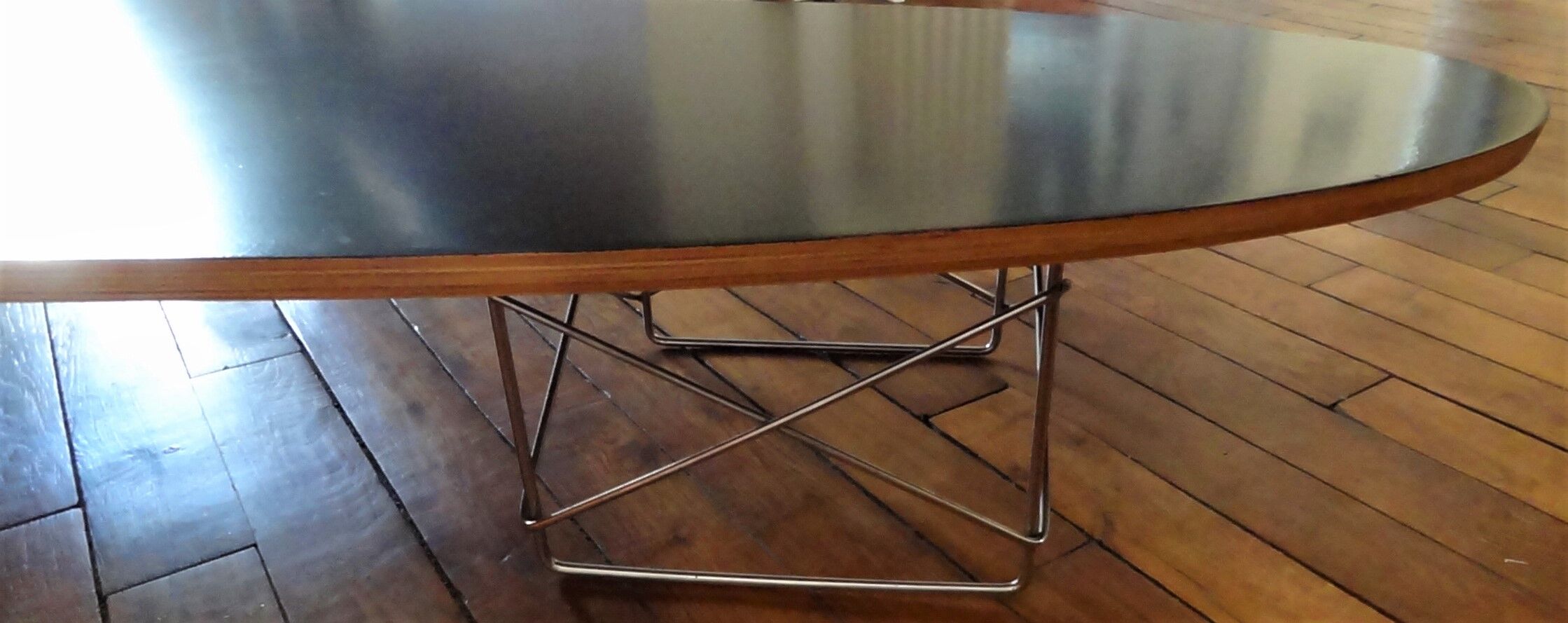 Elliptical coffee table by Charles and Ray Eames