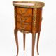 Oval bedside table in Louis XV style with marquetry.