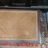 Wooden bench or piano bench with tanned seat