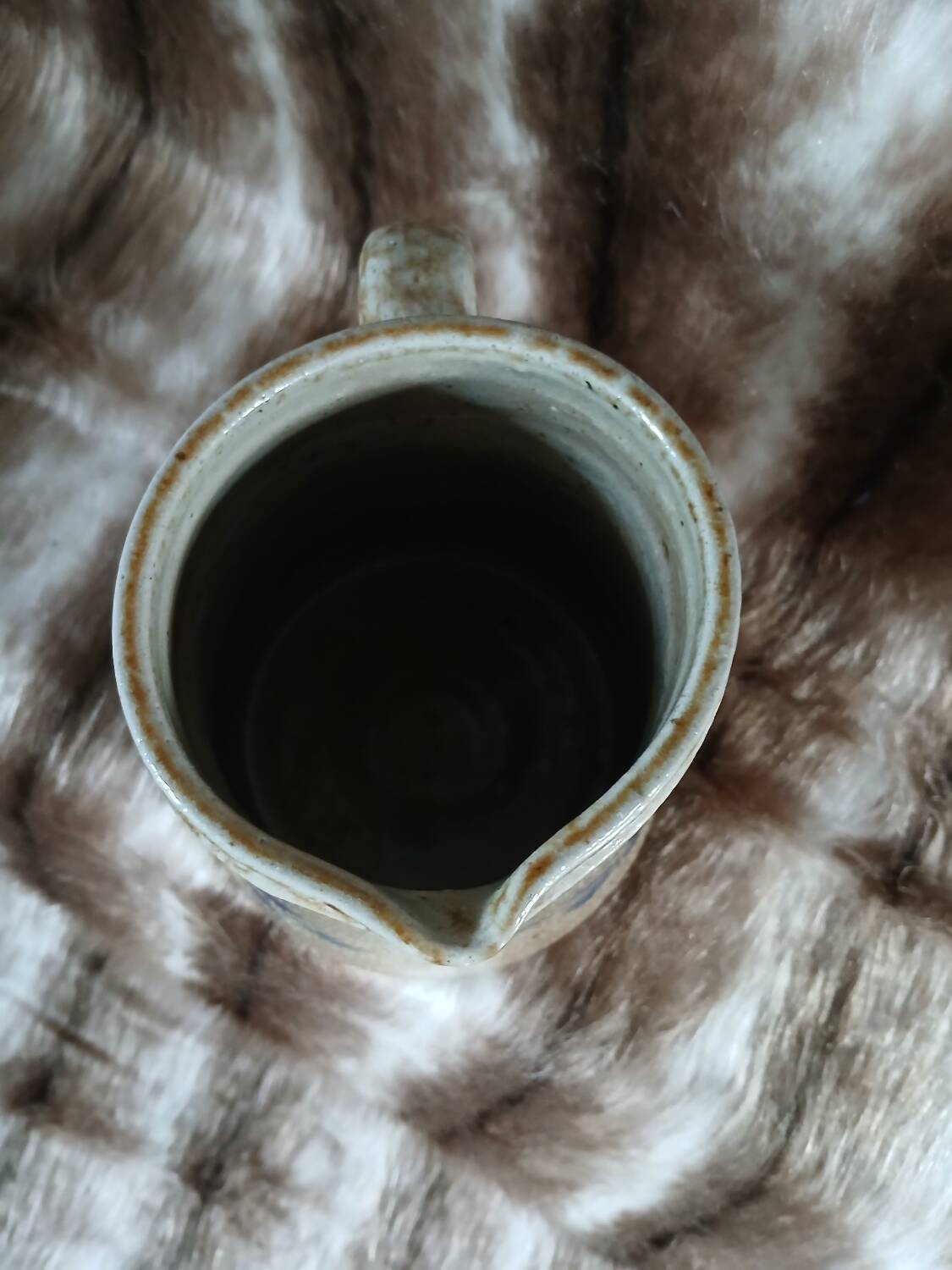 Old glazed stoneware jug