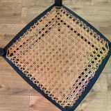 Light wooden chair with caning