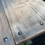 Old table with patinated green legs