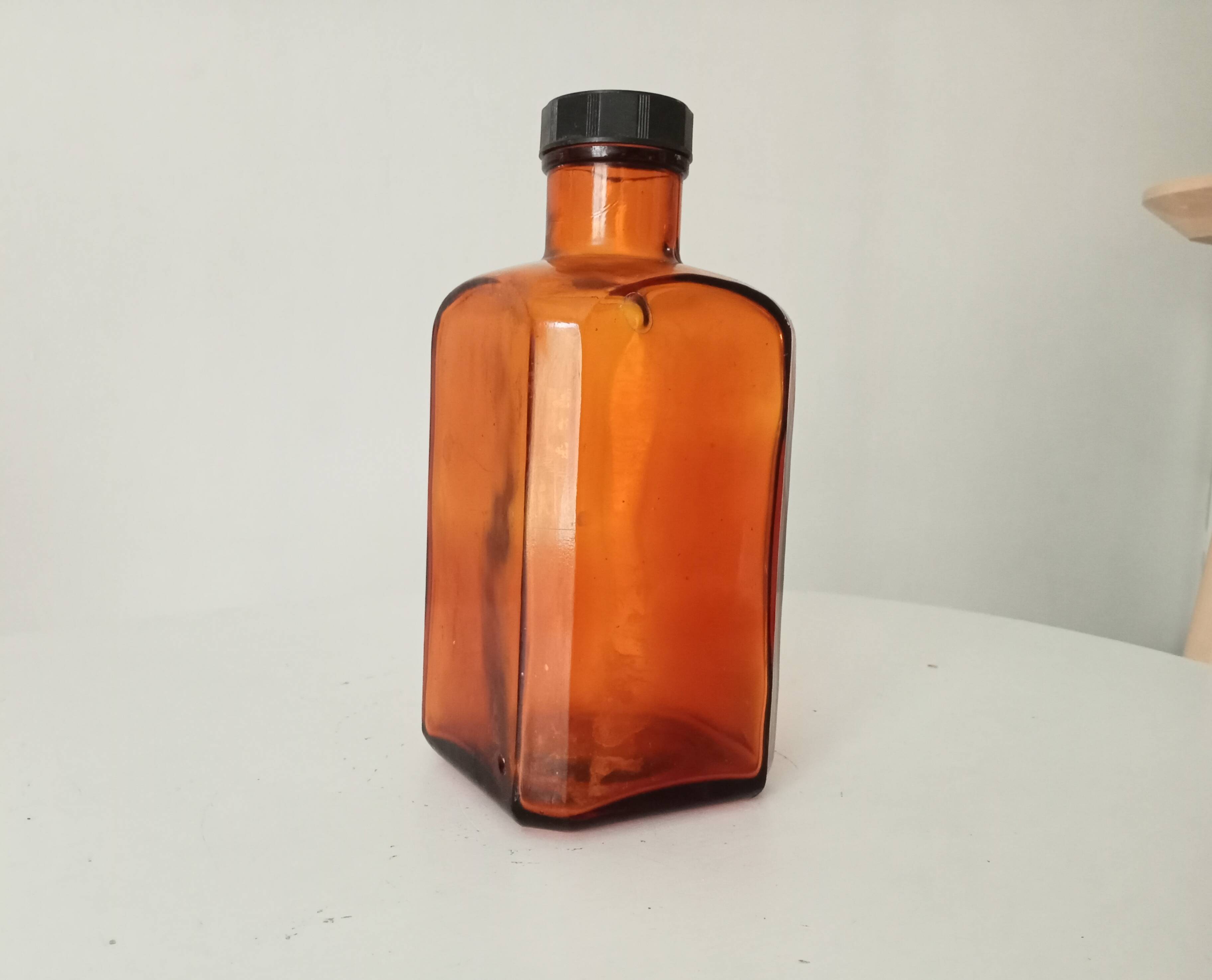 Old amber pharmacy bottle