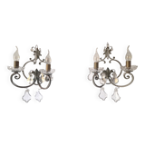 Pair of sconces in patinated metal and crystal tassels
