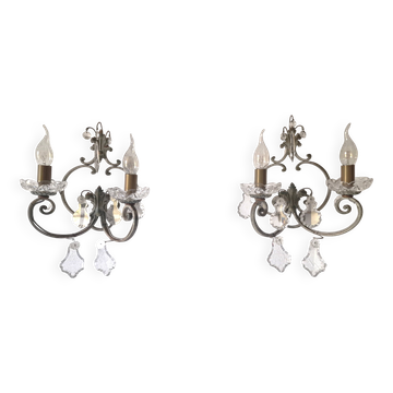 Pair of sconces in patinated metal and crystal tassels