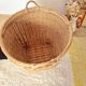 Storage basket for a plant pot in vintage rattan