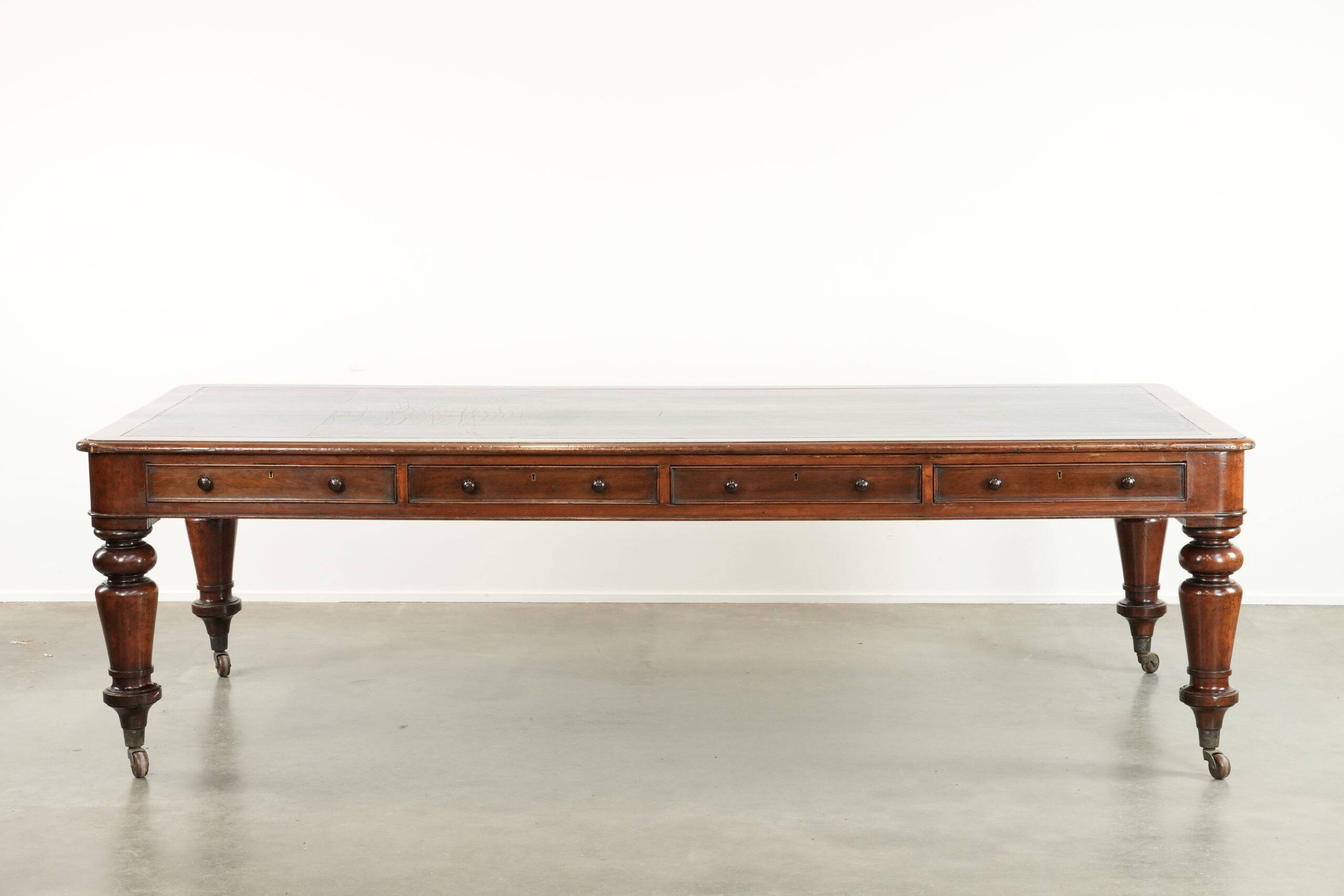 Antique English library table / writing table / desk from the 19th century