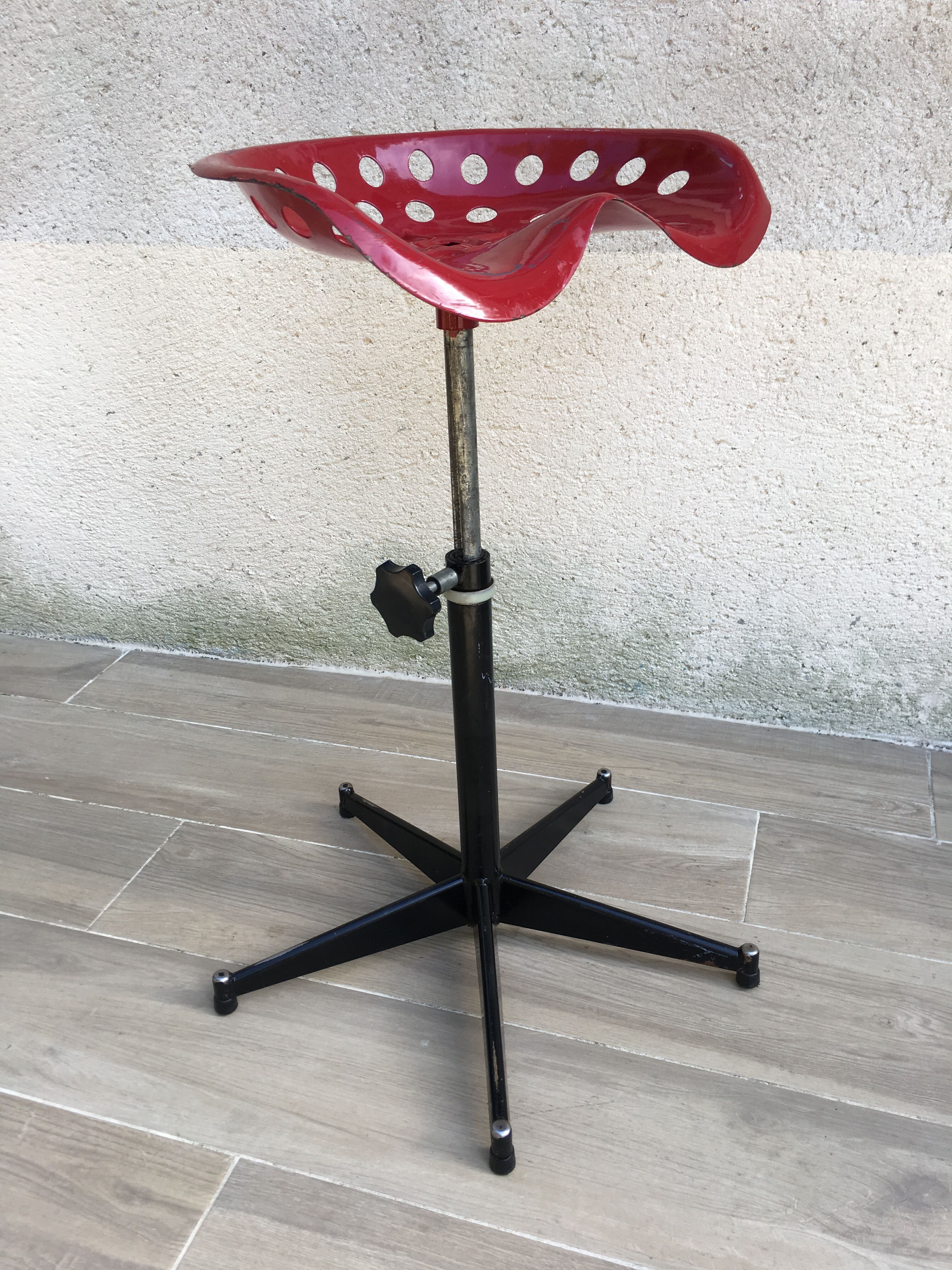 Vintage high stool sitting tractor