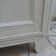 Vintage beige sideboard with oak top.