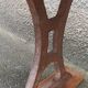 Old wooden bench with cast iron base
