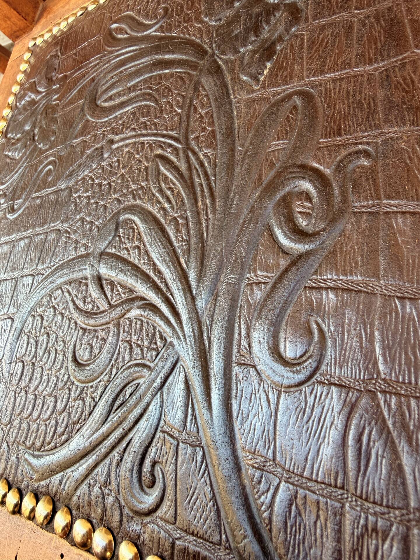 Set of 6 antique turned wooden chairs with embossed leather seats.