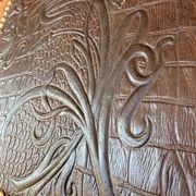 Set of 6 antique turned wooden chairs with embossed leather seats.