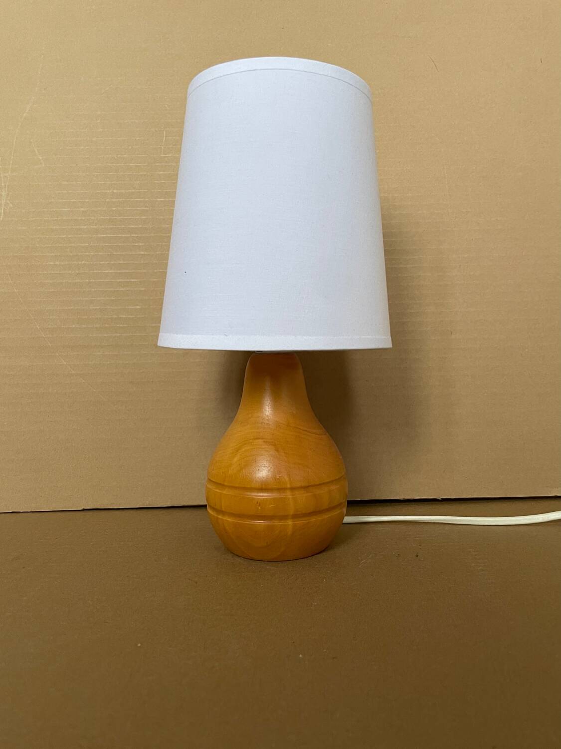 Small old turned wood lamp