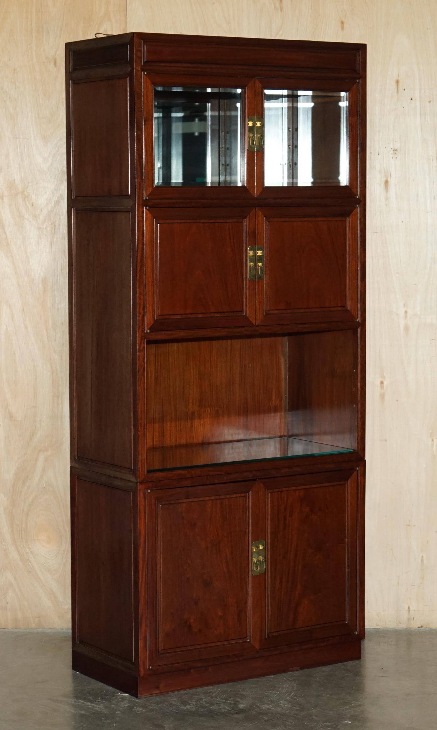 Set of three vintage hardwood military-style bookshelves.