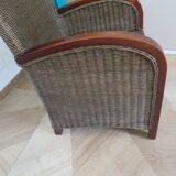 2 armchairs in woven rattan and wood, 1980s