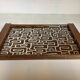 Vintage wooden tray with psychedelic Art Deco patterns.