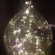 Transparent old demijohn about 8 to 10 L
