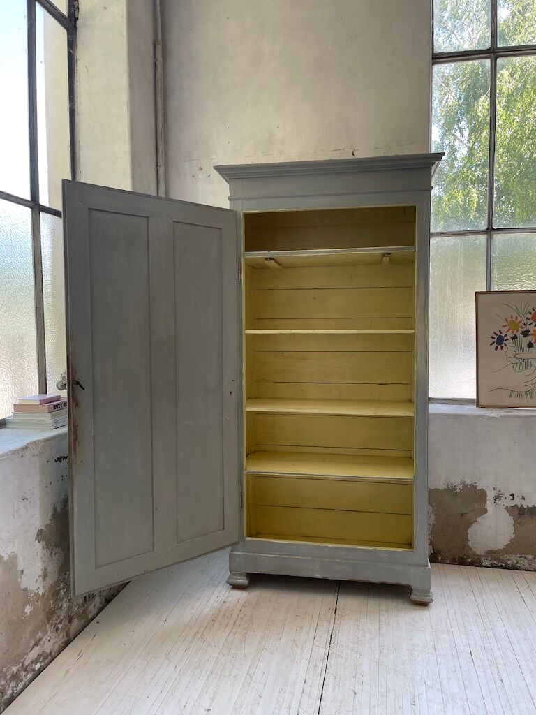 Blue patinated cap cabinet