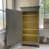 Blue patinated cap cabinet